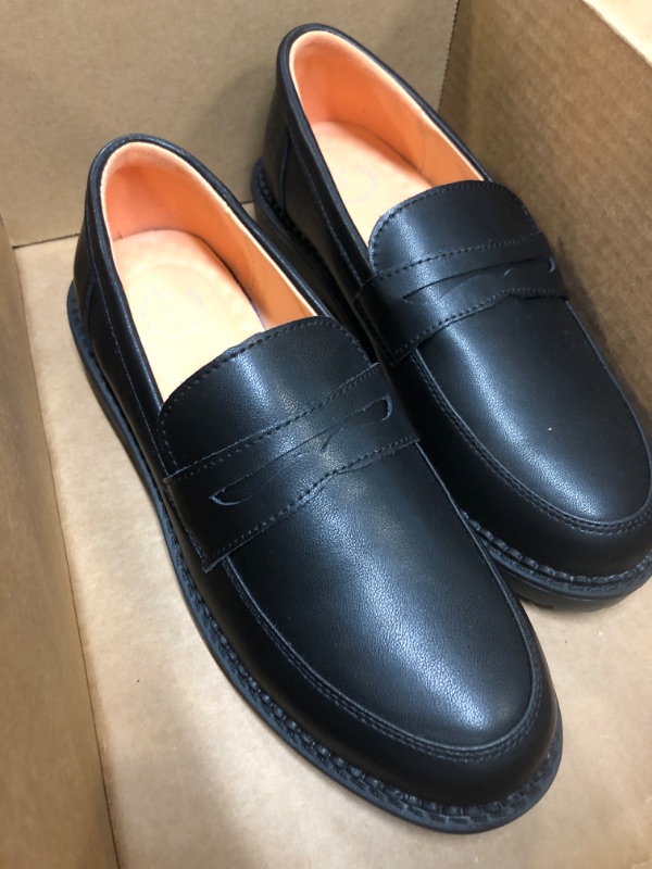 Photo 1 of black leather loafers - size 6