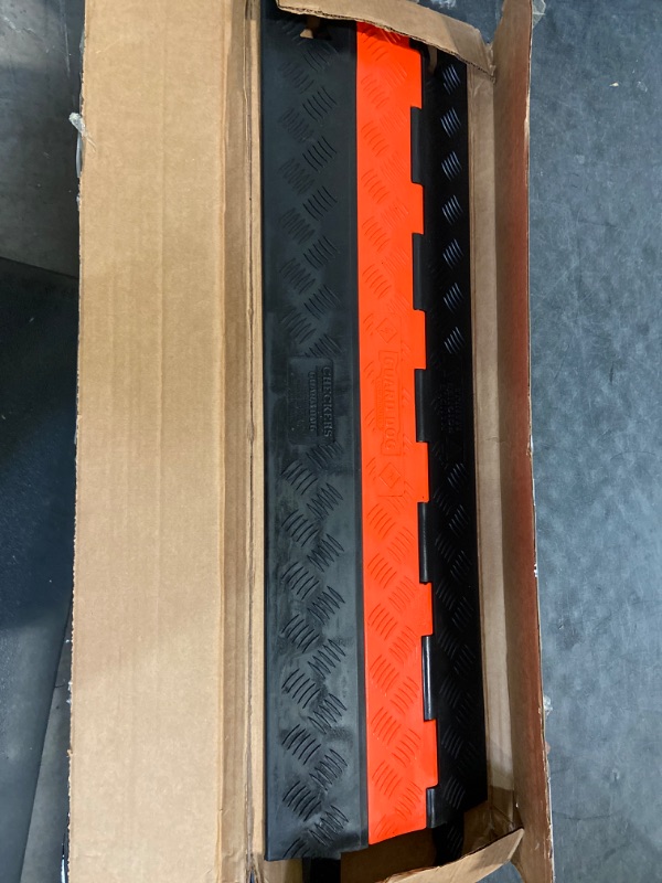 Photo 2 of Guard Dog GD1X75-ST-O/B Polyurethane Heavy Duty 1 Channel Low Profile Cable Protector with ADA Compliant Ramp, Orange Lid with Black Ramp, 36" Length, 10.81" Width, 1.25" Height