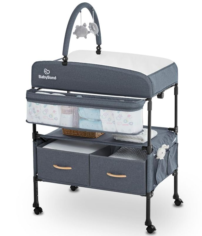 Photo 1 of Portable Baby Changing Table with 2 Storage Baskets, BabyBond Foldable Changing Table Dresser Waterproof Diaper Changing Table Height Adjustable Changing Station for Infant and Newborn