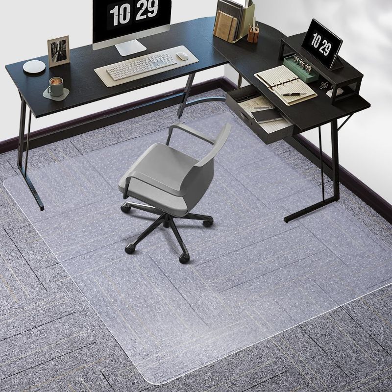 Photo 1 of Clear Chair Mat for Carpet, TYDLE 60"x46" Large Chair Mat for Carpeted Floors, 0.09" Thickness Heavy Duty Office Chair Mat with Grips, Non -Slip Rolling Computer Under Desk Chair Mat for Home (Clear)