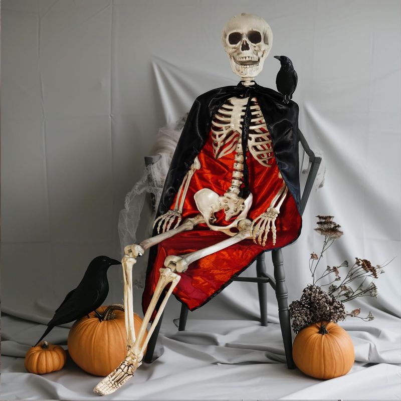 Photo 1 of Dazzle Bright 5.5 FT Life Size Adjustable Skeleton with Black Cloak, Realistic Human Bones Full Body with Posable Joints for Halloween Decor Front Yard Patio Lawn Garden