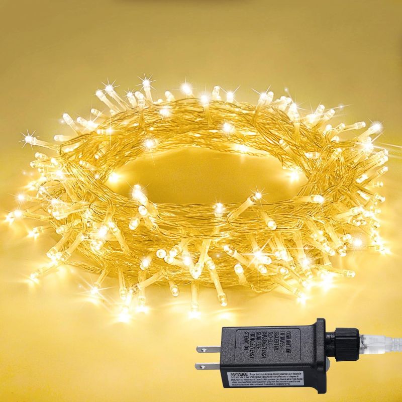 Photo 1 of Connectable Warm White Christmas Lights Indoor, 8 Modes Christmas Tree Lights Plug in Twinkle Fairy String Lights for Bedroom, 33ft 100 LED Christmas Lights Outdoor for Christmas Tree Decor