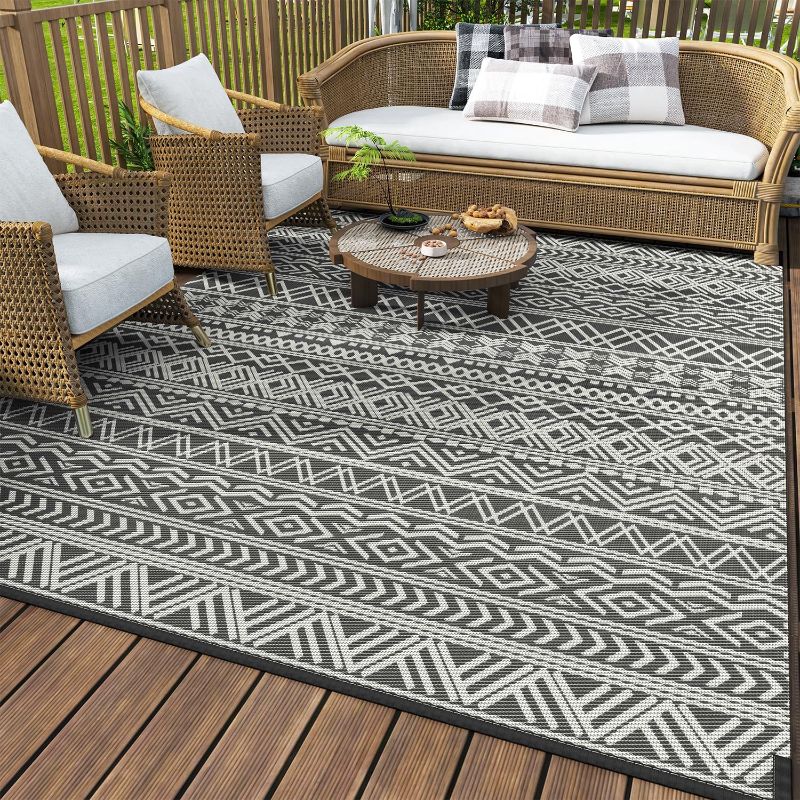 Photo 1 of MontVoo-Outdoor Rug Carpet Waterproof 5x8 ft Reversible Patio Rug RV Camping Rug-Plastic Straw Rug Outside Indoor Outdoor Area Rug for Patio Deck Balcony Picnic Beach Outdoor Decor Boho Grey