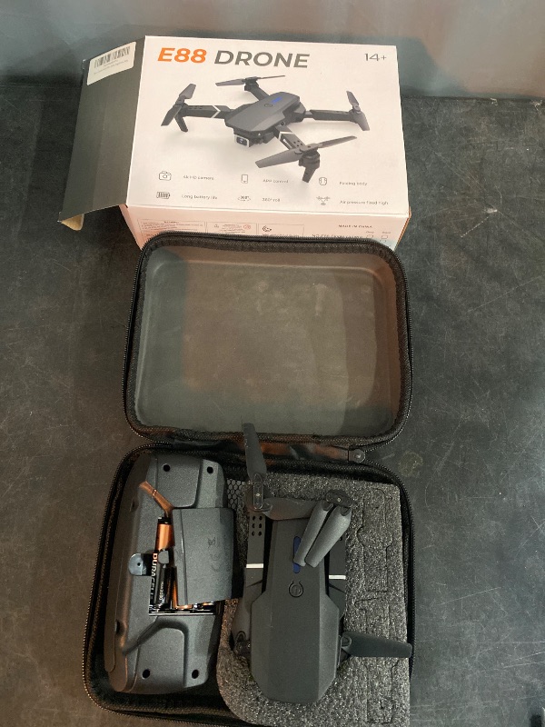 Photo 2 of E88 Pro Drone with 4K Camera, WiFi FPV 1080P HD Dual Foldable RC Quadcopter Altitude Hold, Headless Mode, Visual Positioning, Auto Return Mobile App Control, Black, 7.83 x 7.17 x 2.87 inches - ** NEED TO CHARGE DRONE BATTERY BEFORE USE - NEED TO USE ANDRO