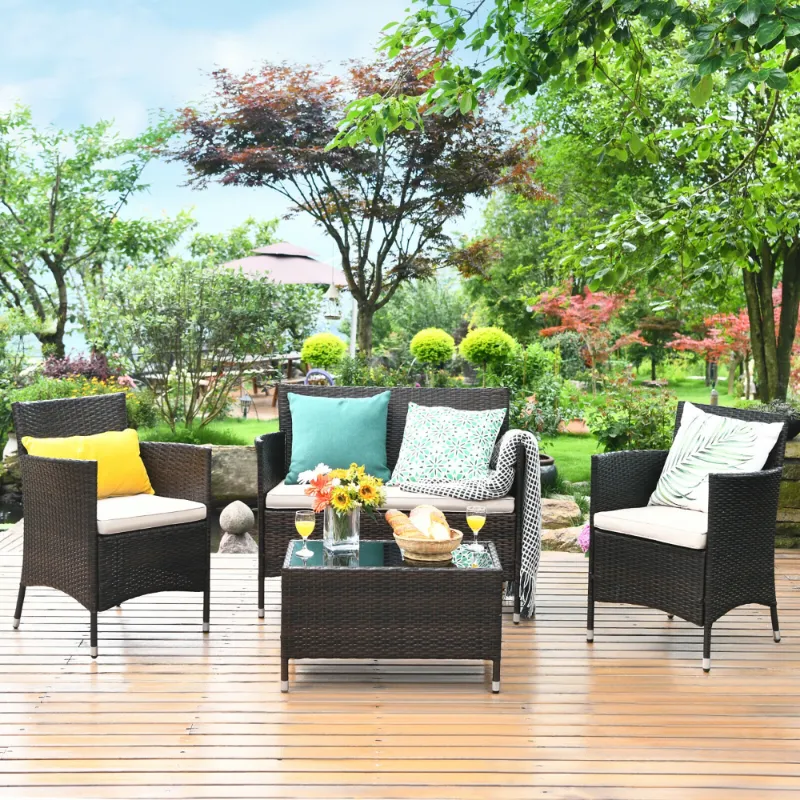 Photo 1 of Costway 4PCS Rattan Patio Furniture Set Cushioned Sofa Chair Coffee Table Garden