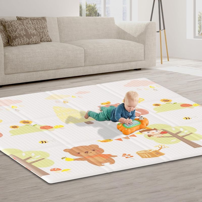 Photo 1 of DOUBLE SIDED Baby Play Mat 74 x 50 Inch Foldable Baby Floor Mat, Reversible Baby Foam Mat for Babies and Toddlers Infants, Portable Waterproof Activity PlayMats for Indoor Outdoor