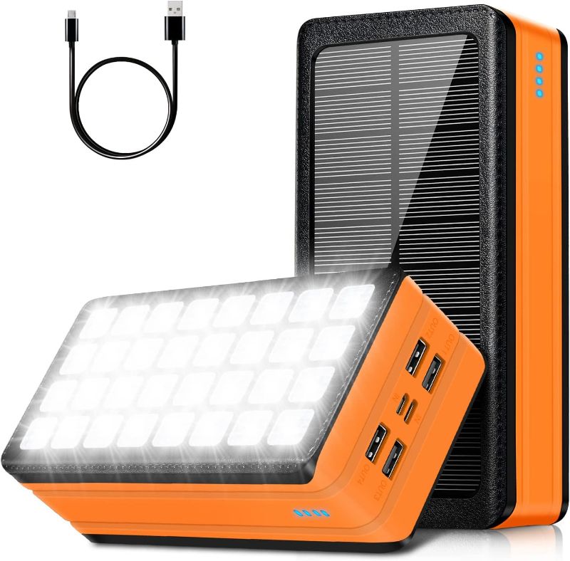 Photo 1 of BLUE Solar Charger Power Bank, 60000mAh Portable Charger Compatible with iPhone, Cell Phone, 32 LEDs External Battery Pack for Outdoor Camping, Home Emergency, 4 Output& 2 Input Ports (BLUE)
