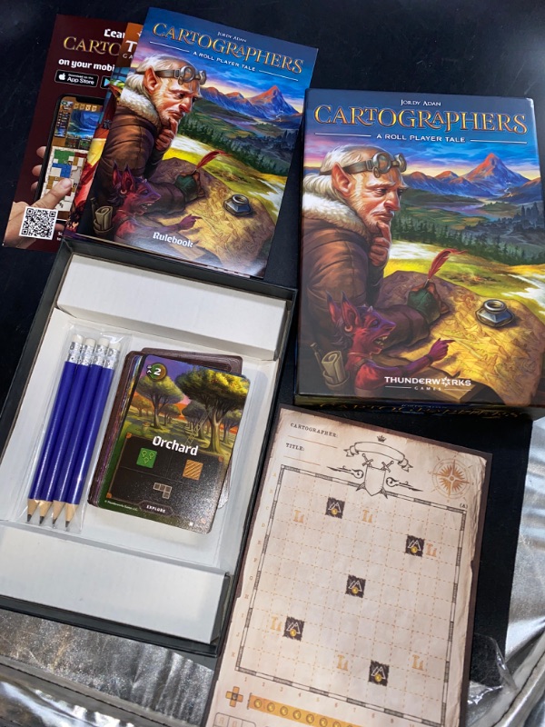 Photo 2 of Thunderworks Games - Cartographers: A Roll Player Tale | Award-Winning Game of Fantasy Map Drawing | Strategy Board Game | Flip and Write | Family Game for 1-100 Players | 30-45 Minutes
