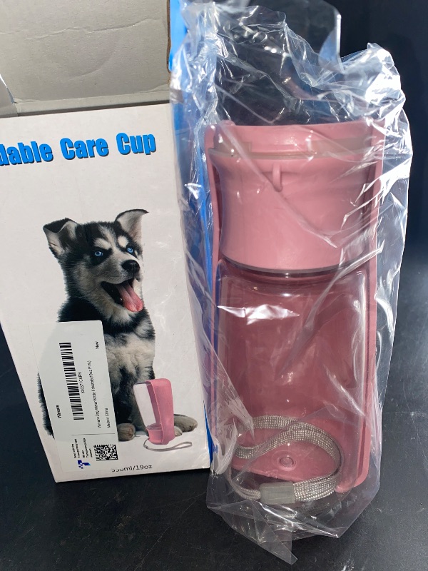 Photo 2 of Dog Water Bottle,19oz Foldable Dishwasher Safe Portable Dog Water Bottle,Leak Proof Dog Water Bottle Dispenser Easy to Carry&Feed Dog Bottle for Walking Hiking Travel,Food Grade Plastic,Pink
