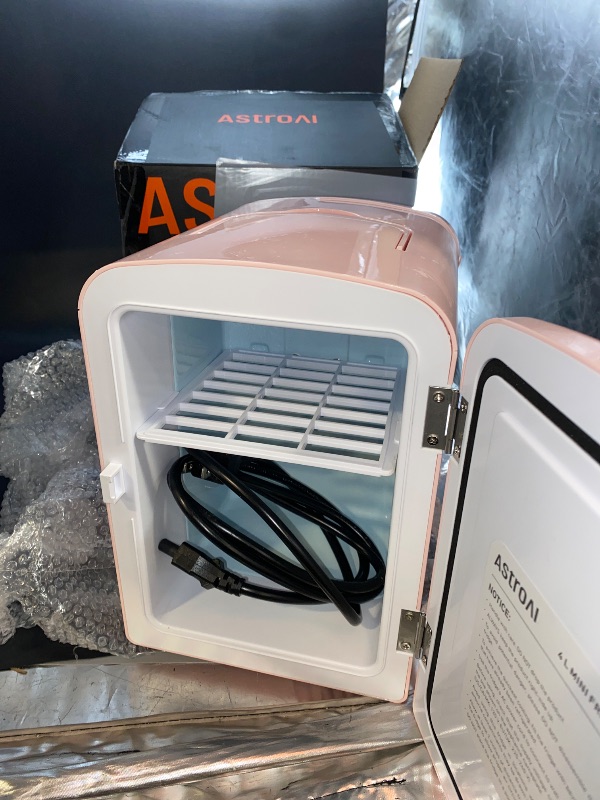 Photo 2 of AstroAI Mini Fridge, 4 Liter/6 Can AC/DC Portable Thermoelectric Cooler Refrigerators for Skincare, Beverage, Food, Home, Office and Car, ETL Listed (Pink)
