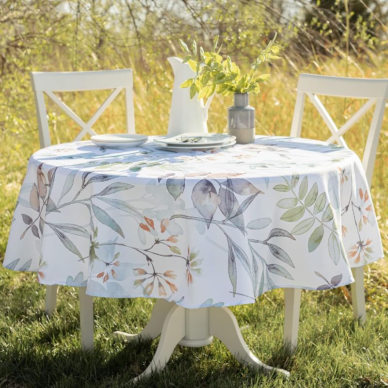 Photo 1 of Benson Mills Spillproof Spring/Summer Heavyweight Fabric Indoor Outdoor Tablecloth, Outdoor Table Cloth for Round Tables, Picnic/Patio Table Covers (70" Round, Botanica)