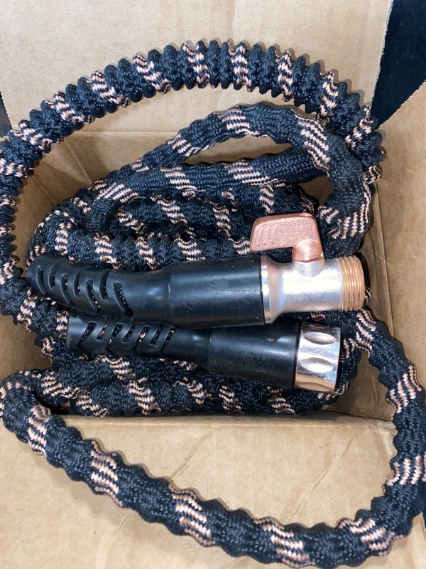 Photo 2 of ** FINAL SALE ** Pocket Hose Copper Bullet Expandable Garden Hose 50 FT w/10 Pattern Thumb Spray Nozzle AS-SEEN-ON-TV 650psi 3/4 in Patented Lead-Free Ultra-Lightweight Solid Copper Anodized Aluminum Fittings No-Kink ** SOLD AS IS **
