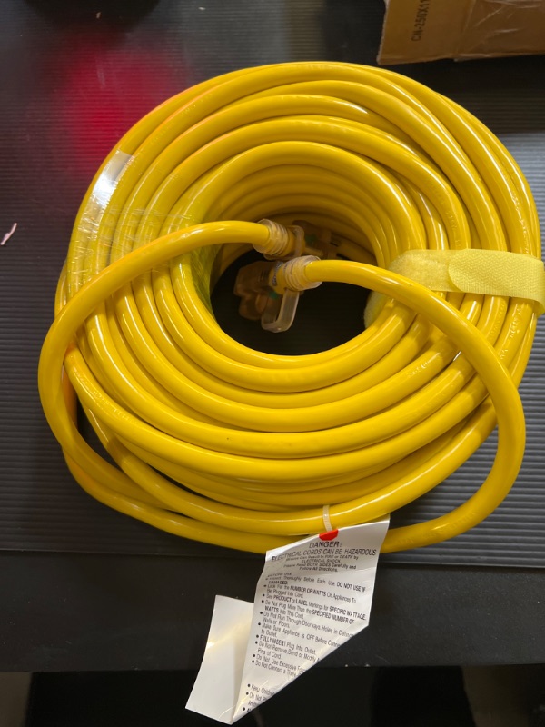 Photo 1 of 12/3 Gauge Heavy Duty Outdoor Extension Cord 100 ft Waterproof with Lighted end, Flexible Cold-Resistant 3 Prong Electric Cord Outside, 15Amp 1875W 12AWG SJTW, Yellow, ETL HUANCHAIN