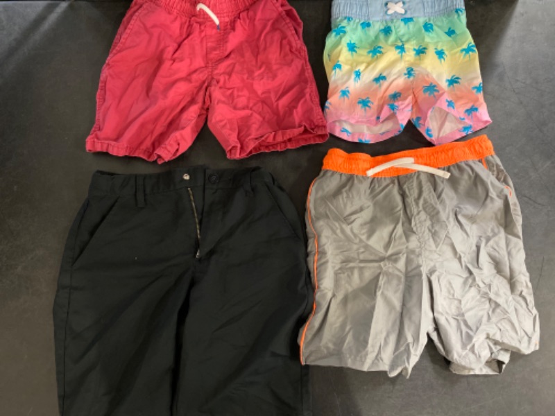 Photo 3 of 4 Item Mixed Children Shorts 
Boys' Playwear 'At the Knee' Pull-On Shorts - Cat & Jack (S 6/7) + Baby Boys' Swim Board Shorts - Cat & Jack (3T) + Cat and Jack Swim Trunks Grey and Orange (L 10/12) + Quick Dry Cat and Jack Dress Shorts Black (10)