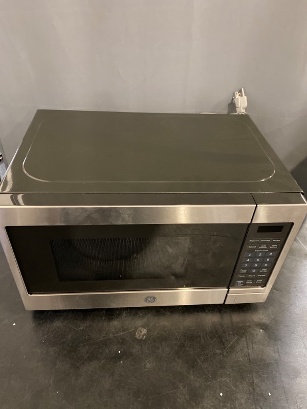 Photo 2 of GE JEM3072SHSS Microwave Oven 700 Watts, Auto or Manual Defrost Option, Kitchen Essentials for The Countertop, 0.7 Cubic Feet Capacity, Stainless Steel