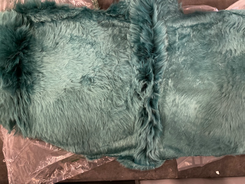 Photo 2 of 100% Genuine Long Wool Sheepskin Rug, Luxury New Zealand Sheepskin, Natural Silky Soft Lamb Skin, Thick & Fluffy, Long Runner for Bedroom & Living Area, 2X 6 ft. (Teal)