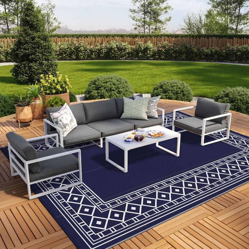 Photo 1 of GENIMO Outdoor Rug Waterproof 9' x 12' for Patio, Foldable Reversible Plastic Straw Carpet for Travel Trailers, Outside Area Mat for Rv, Deck, Picnic, Porch, Camper, Balcony, Beach, Blue & White