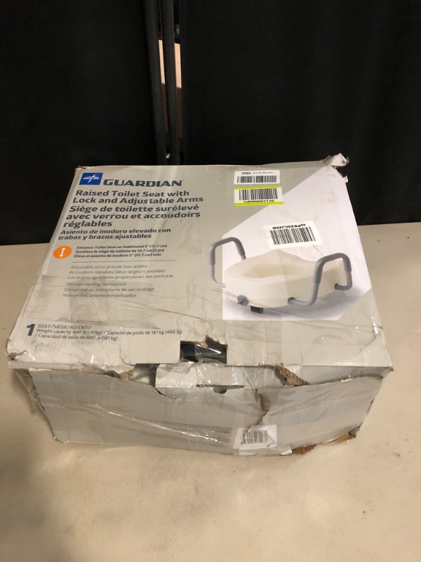 Photo 3 of Medline 5" Elongated Raised Toilet Seat, with Lock and Removable Padded Arms- A Medical Seat for Seniors, Elderly, Adults, or Post-Surgery Recovery, 1 Ct.