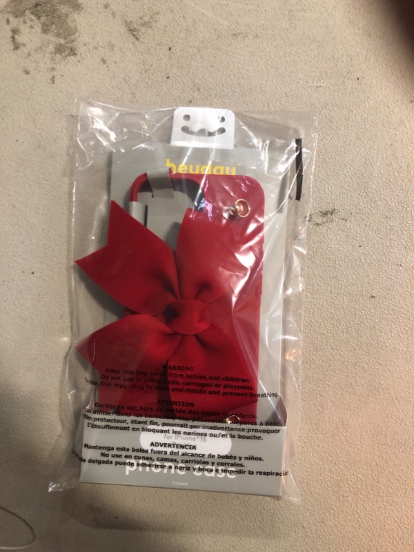 Photo 3 of HEYDAY NWT silicone phone case iPhone 16 with red bow