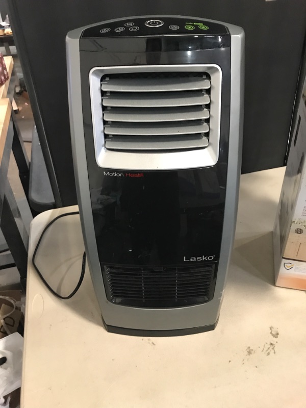 Photo 2 of Lasko 22.5" 1500W Motion Heat Plus Ceramic Room Heater with Remote, Black/Silver, CC23185