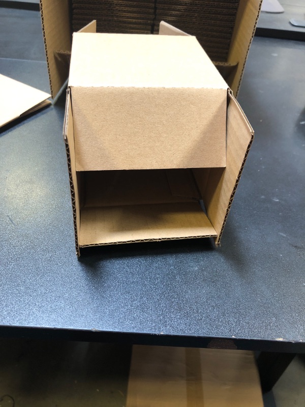 Photo 2 of 4 x 4 inch cardboard boxes 26 count