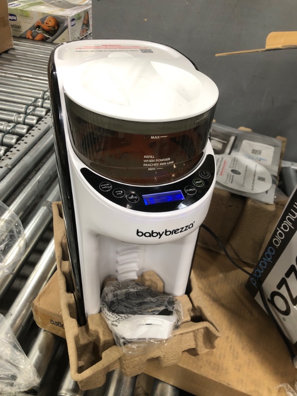 Photo 2 of *USED, VERY DIRTY, FORMULA LEFT IN MACHINE. DEEP CLEANING REQUIRED BEFORE USE.*
New and Improved Baby Brezza Formula Pro Advanced Formula Dispenser Machine - Automatically Mix a Warm Formula Bottle Instantly - Easily Make Bottle with Automatic Powder Blen