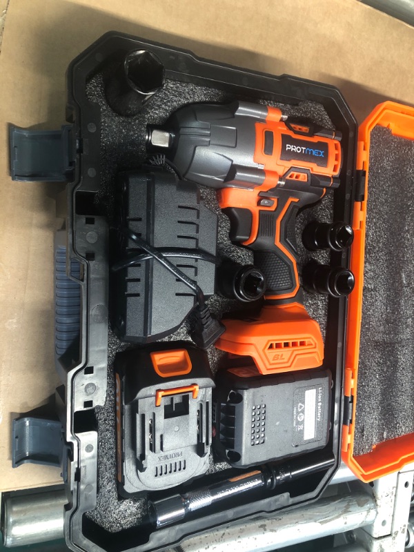 Photo 2 of ***(MINOR DAMAGE/ SEE NOTES)***
Cordless Impact Wrench, 900Ft-lbs (1200N.m) 1/2" Brushless Impact Gun, 21V High Torque Power Impact Driver, 2x4.0Ah Batteries Electric Impact Motor Variable Speeds for Car/Truck RV/Mower