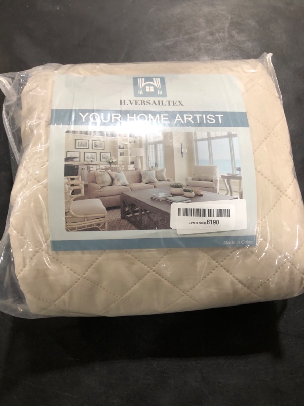 Photo 1 of H.VERSAILTEX Sofa Protector for Dogs/Cats/Pets Sofa Slipcover Quilted Furniture Protector with Non Slip Elastic Strap Water Resistant Sofa Covers Couch Covers Seat Width: 66" (Sofa, Ivory/Beige)