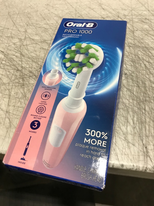 Photo 2 of Oral-B Pro 1000 Rechargeable Electric Toothbrush, Pink