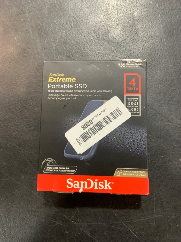 Photo 2 of SanDisk 4TB Extreme Portable SSD - Up to 1050MB/s, USB-C, USB 3.2 Gen 2, IP65 Water and Dust Resistance, Updated Firmware - External Solid State Drive - SDSSDE61-4T00-G25