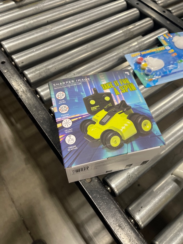 Photo 1 of Sharper Image® Slideways Racer – Drifting Stunt RC Car with Rechargeable Battery, 3 Driving Modes, 90-Degree Wheel Rotation, LED Lights, 2.4 GHz Remote Control, High-Speed RC Stunt Car Toy for Ages 6+