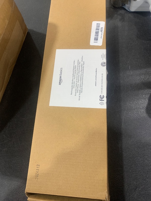 Photo 1 of Amazon Basics Wireless Keyboard and Mouse Combo - Rechargeable, Ultra Slim Design, Quiet, Full Size, Number Pad, QWERTY, Black