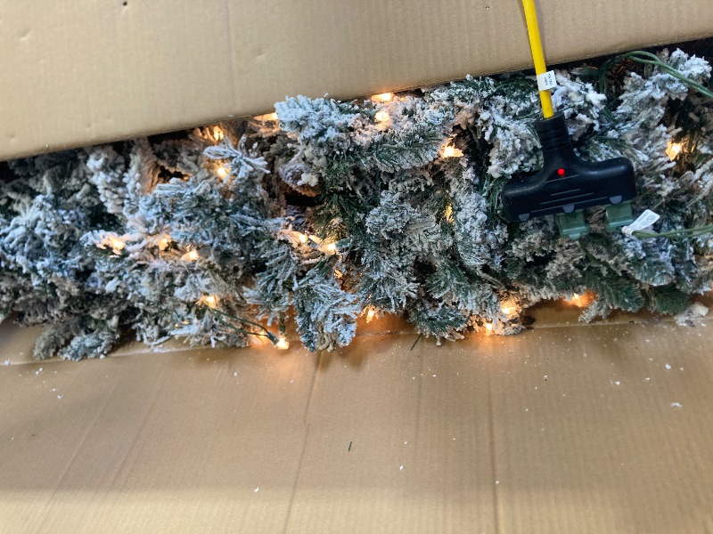 Photo 1 of Puleo International 6.5 Foot Pre-Lit Flocked Bennington Fir Artificial Christmas Tree with 350 UL Listed Clear Lights