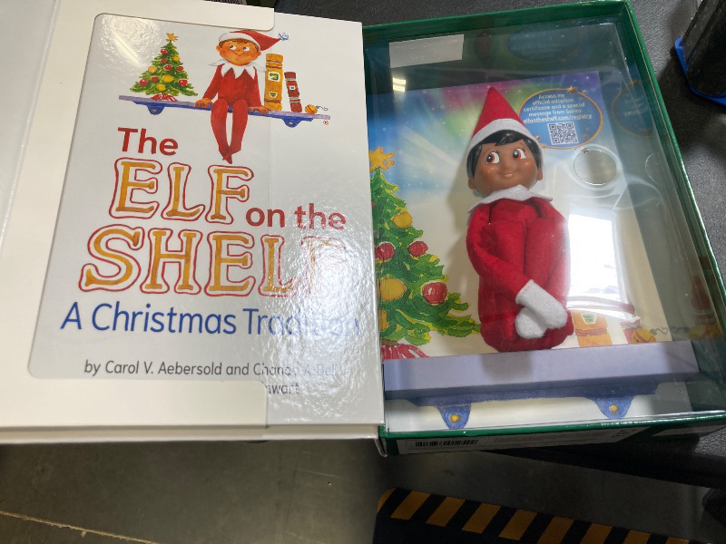 Photo 2 of The Elf on the Shelf: A Christmas Tradition - Boy Scout Elf with Brown Eyes - Includes Artfully Illustrated Storybook, Keepsake Box and Official Adoption Certificate