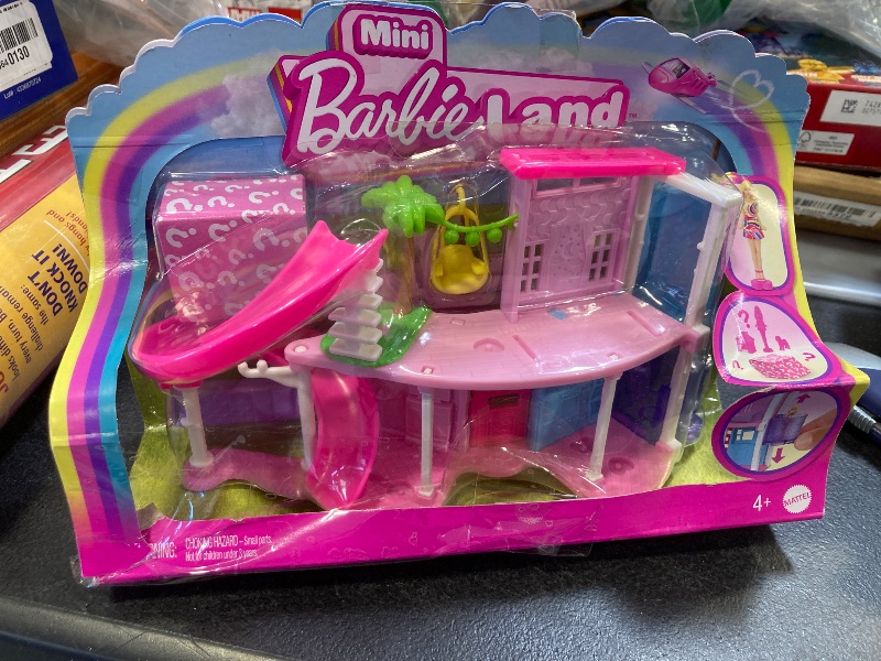 Photo 1 of Barbie Mini BarbieLand Doll House Sets, Mini Dreamhouse with Surprise 1.5-inch Doll, Furniture & Accessories, Plus Elevator & Pool