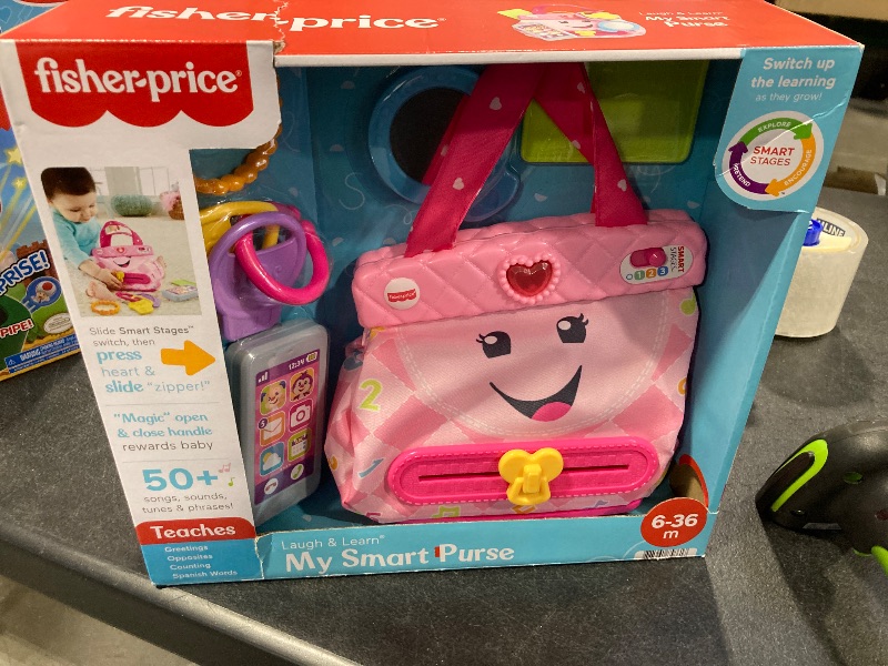 Photo 1 of Fisher-Price Baby & Toddler Toy Laugh & Learn My Smart Purse with Lights & Smart Stages Learning Songs for Infants Ages 6+ Months