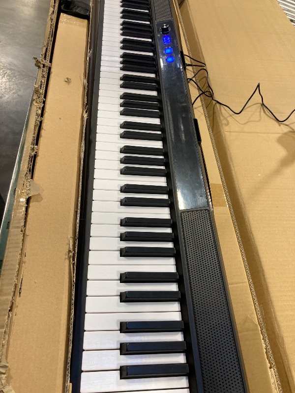 Photo 1 of UISCOM 88 Key Semi-weighted Electronic Keyboard Piano,Full Size Digital Piano Portable Keyboard with Stand, Sustain Pedal, Power Supply?MIDI/USB/MP3 Function for Beginners at Home/Stage?Black?