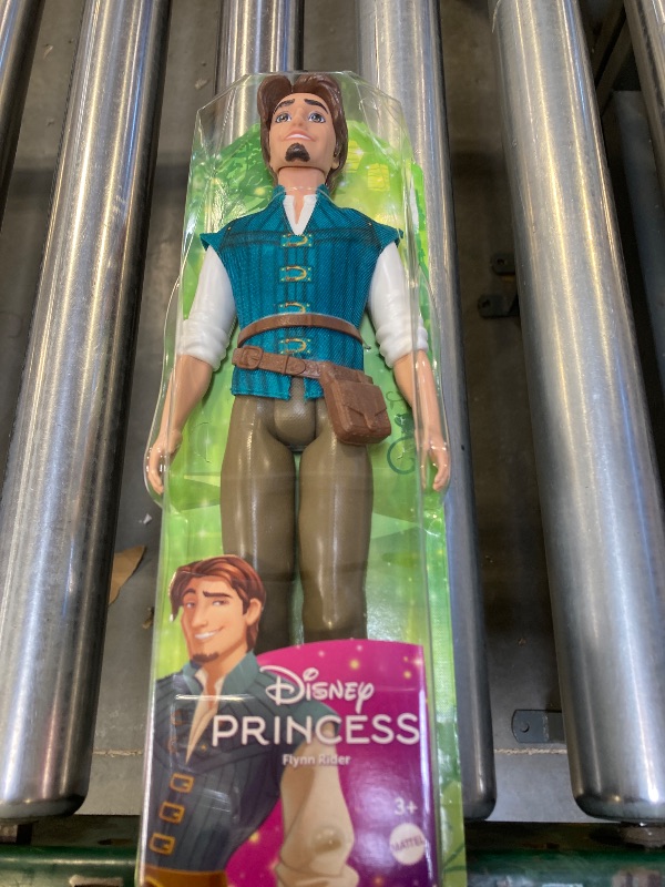 Photo 2 of Mattel Disney Princess Toys, Flynn Rider Fashion Doll in Signature Outfit Inspired by the Disney Movie Tangled, Posable Character