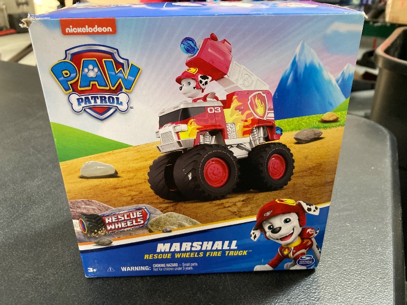 Photo 2 of Paw Patrol: Rescue Wheels Marshall’s Firetruck, Toy Truck with Projectile Launcher and Collectible Action Figure, Kids Toys for Boys & Girls Ages 3+