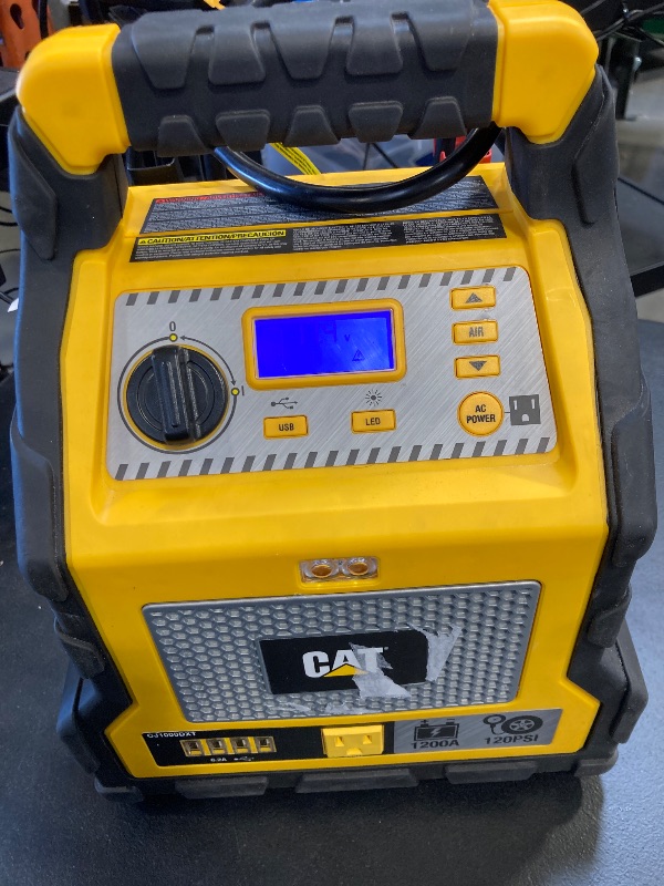 Photo 2 of Cat Power Station with 1,200-Peak-Amp Jump Starter, Tire Compressor, and Power Inverter, CJ1000DXT