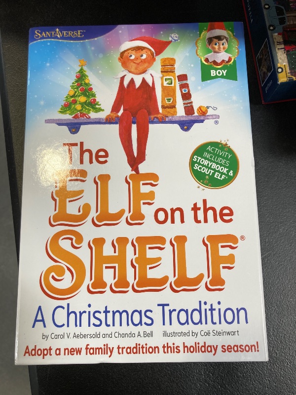 Photo 2 of The Elf on the Shelf: A Christmas Tradition - Boy Scout Elf with Blue Eyes - Includes Artfully Illustrated Storybook, Keepsake Box and Official Adoption Certificate