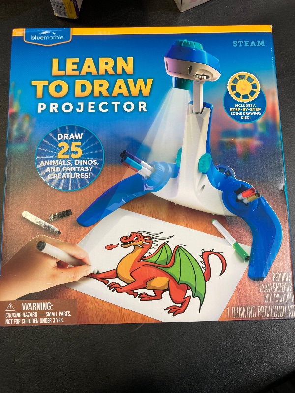 Photo 2 of Blue Marble Learn to Draw Projector - Kids Image Projector for Tracing with 9 Colorful Markers & 4 Image Discs with 25 Animals, Dinos & Creatures to Draw, Patent-Pending Drawing Projector for Kids