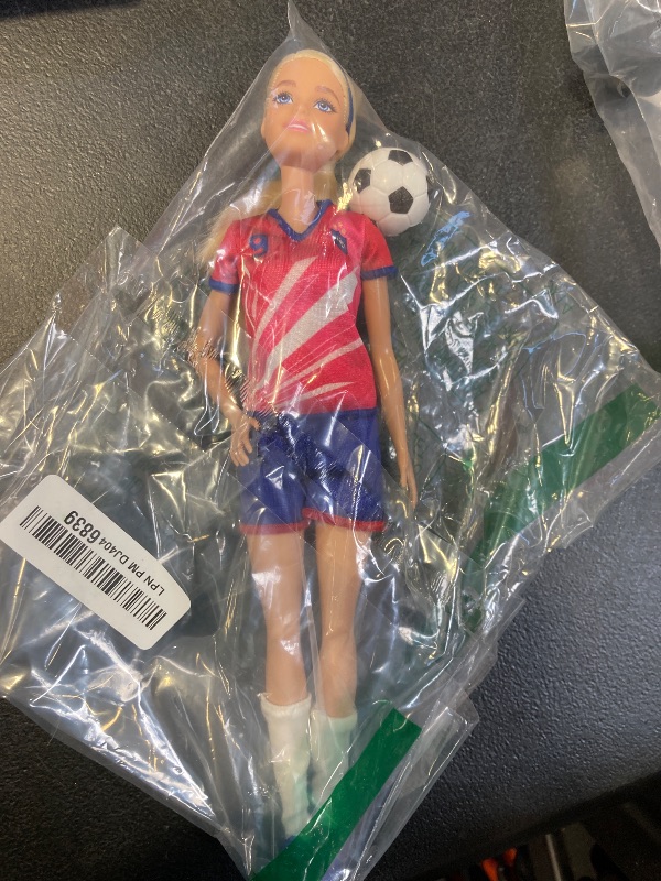 Photo 1 of Barbie Careers Fashion Doll & Accessory, Soccer Player with Blonde Ponytail, #9 Uniform, Tall Socks, Cleats & Ball