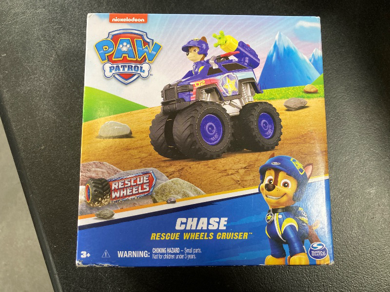 Photo 2 of Paw Patrol: Rescue Wheels Chase’s Cruiser, Toy Truck with Projectile Launcher and Collectible Action Figure, Kids Toys for Boys & Girls Ages 3 and up