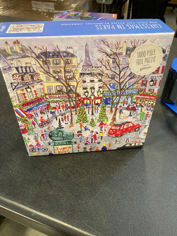 Photo 1 of Galison Christmas in Paris – 1000 Piece Michael Storrings Jigsaw Puzzle Featuring Beautiful Artwork of A Busy Holiday Street in Saint Germain Paris