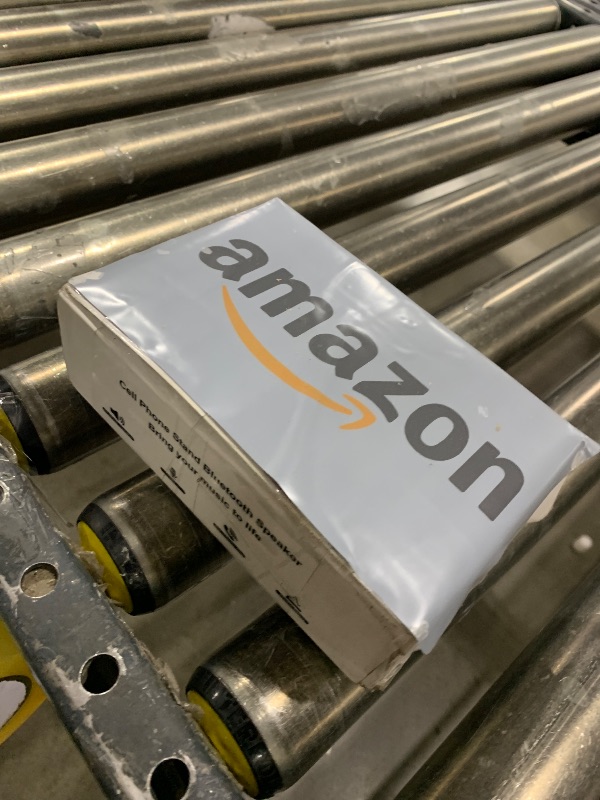 Photo 1 of Cell Phone Stand with Wireless Bluetooth Speaker and Anti-Slip Base HD Surround Sound Perfect for Home and Outdoors with Bluetooth Speaker for Desk Compatible with iPhone/ipad/Samsung Galaxy