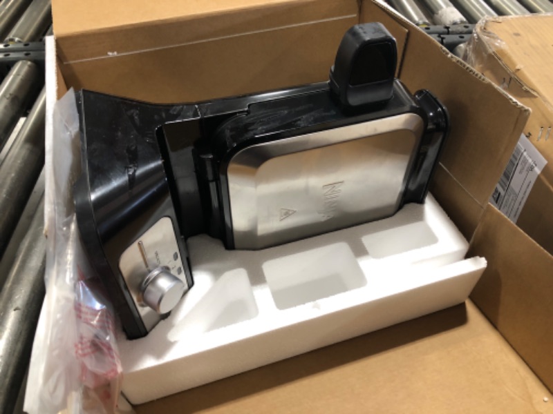 View 2 of Ninja BW1001 NeverStick PRO Belgian Waffle Maker, Vertical Design, 5 Shade Settings, with Precision-Pour Cup & Chef-curated Recipe Guide, Black & Silver