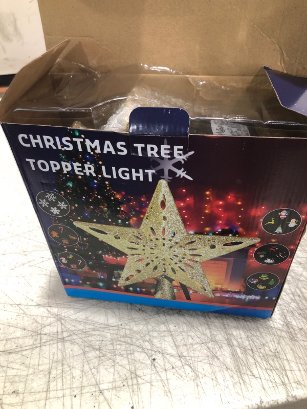 Photo 1 of DG-Direct Christmas Tree Topper Lighted Star with 6 Projected Patterns,3D Hollow Sparkling Star Christmas Tree Topper with Rotating Magic Projector for Christmas Tree Ornament