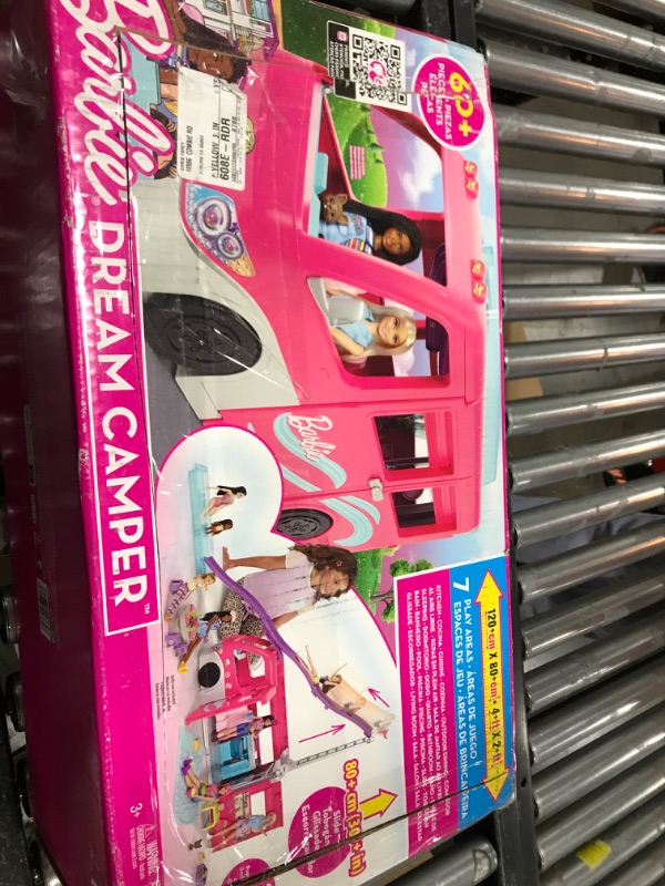 Photo 1 of Barbie Camper Playset, DreamCamper Toy Vehicle with 60 Doll-Sized Accessories Including Furniture, Pool & 30-inch Slide