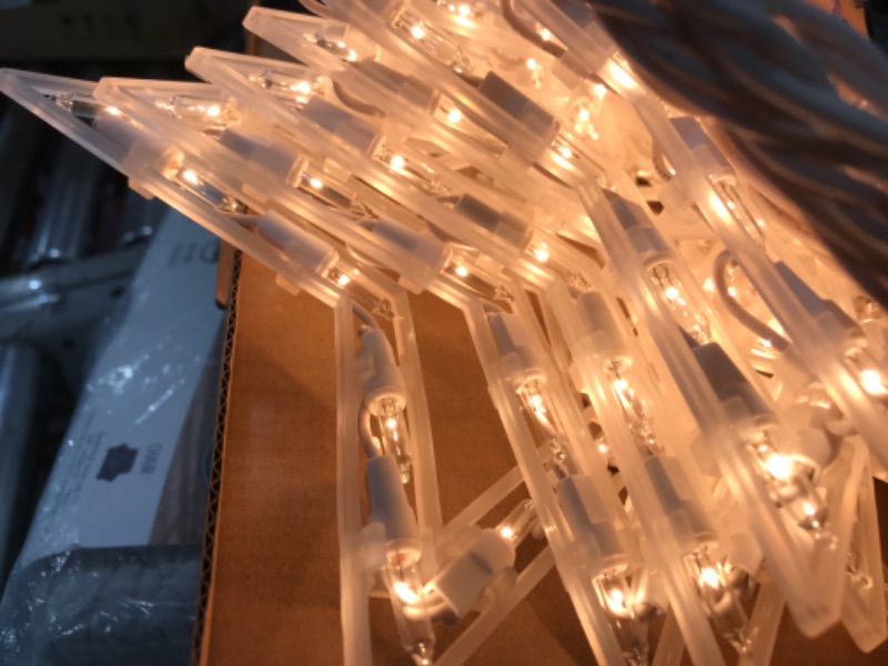 Photo 1 of Snowflake Christmas String Lights with 9 Drops - 13ft 150 Mini Bulb Icicle Lights with Clips, Plug-in Connectable Hanging Lights for Front Porch House Tree Pation Decor Holiday Décor